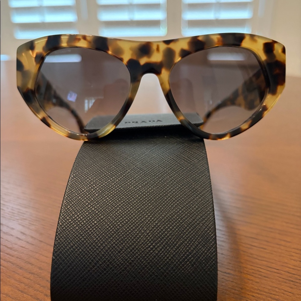 Prada cat eye sunglasses. vintage like new hardly wear them.